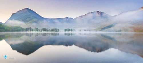 Haystacks Surrounded in Mist