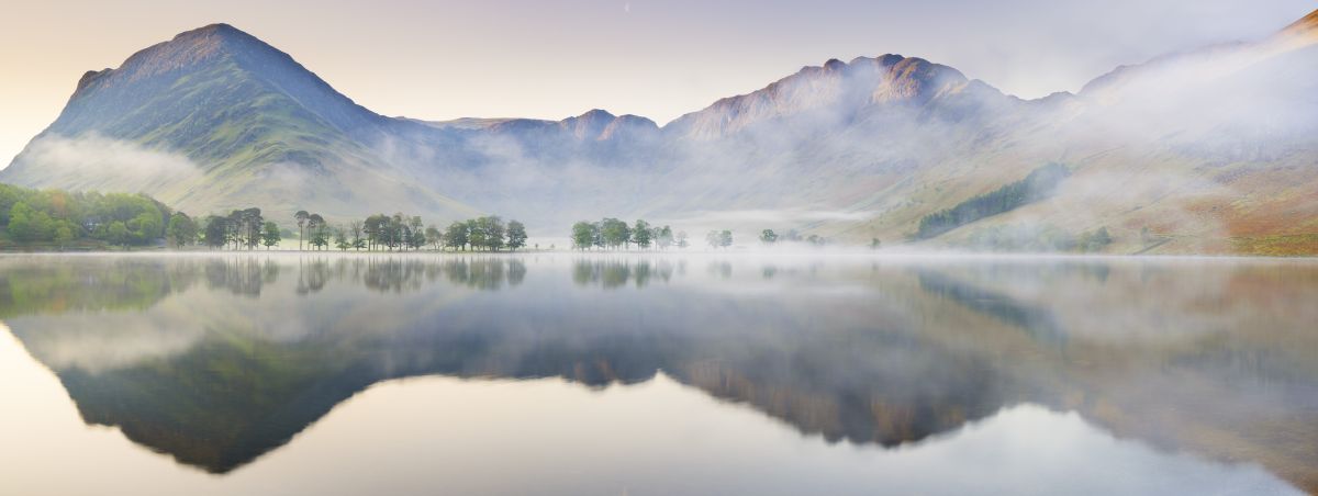 Haystacks Surrounded in Mist